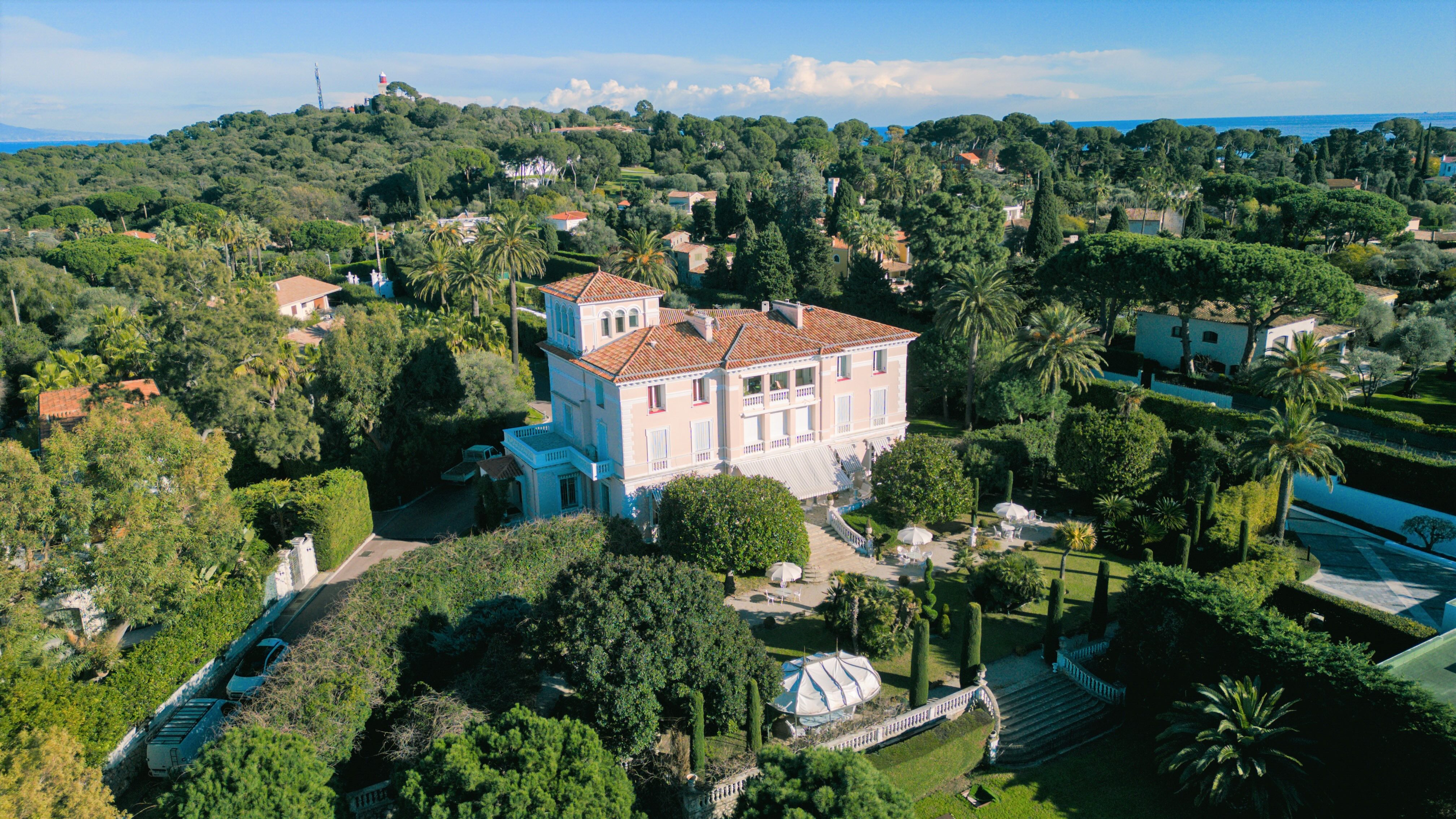 Aerial view of Château Algarve above the gardens and Mediterranean coastline